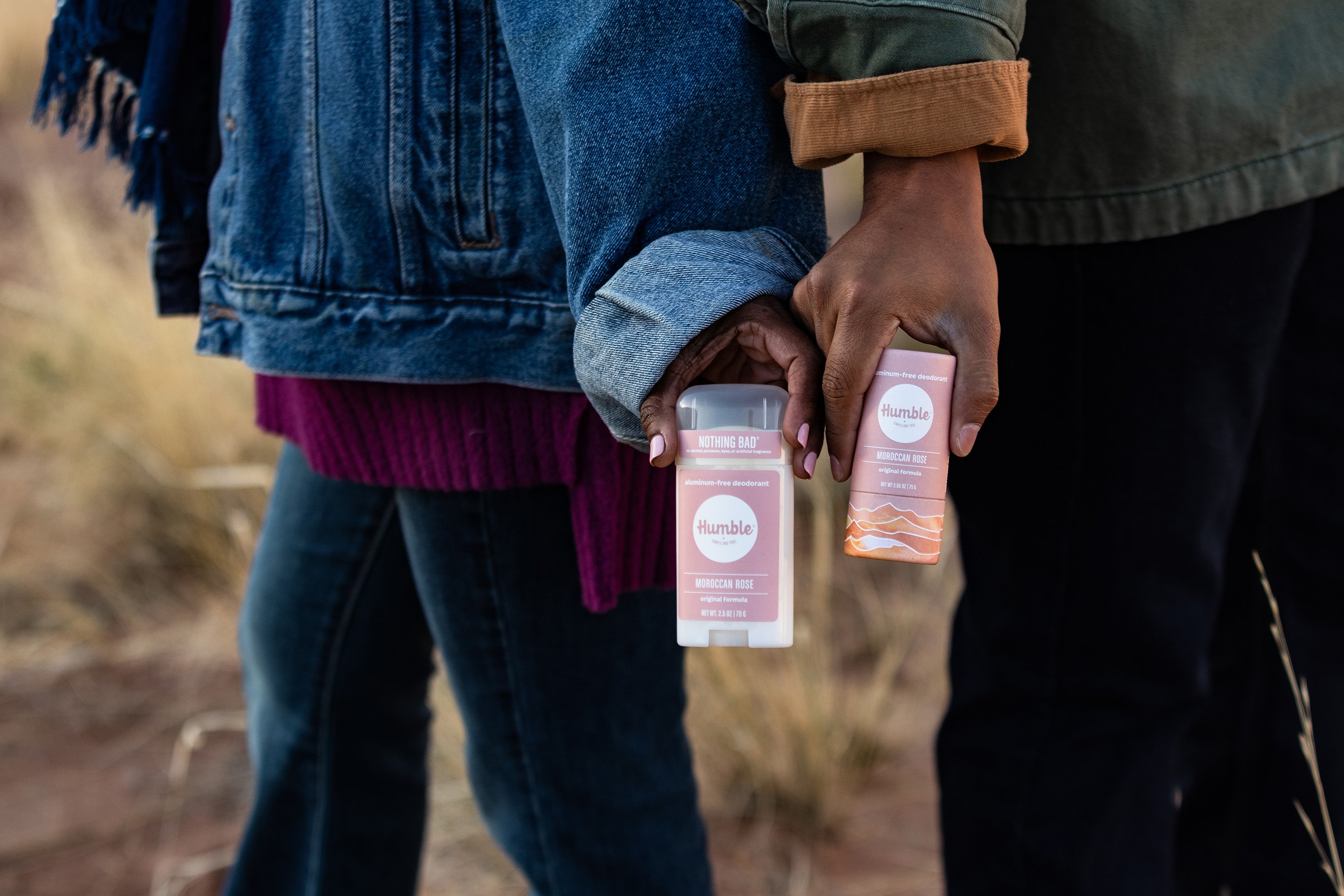 People holding Moroccan rose deodorant