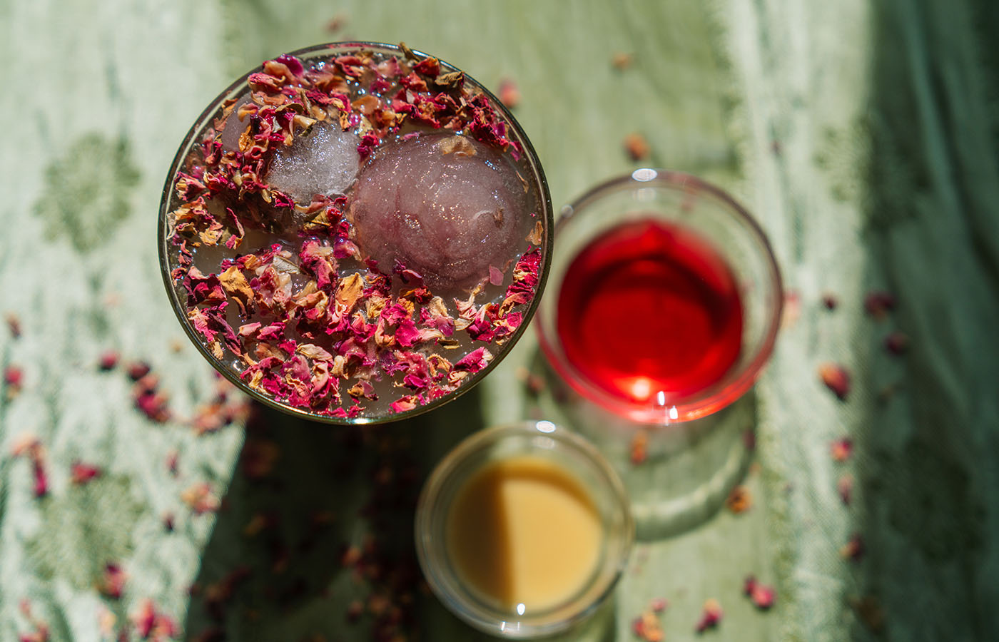 Overhead shot of rose and ginger mocktail and ingredients