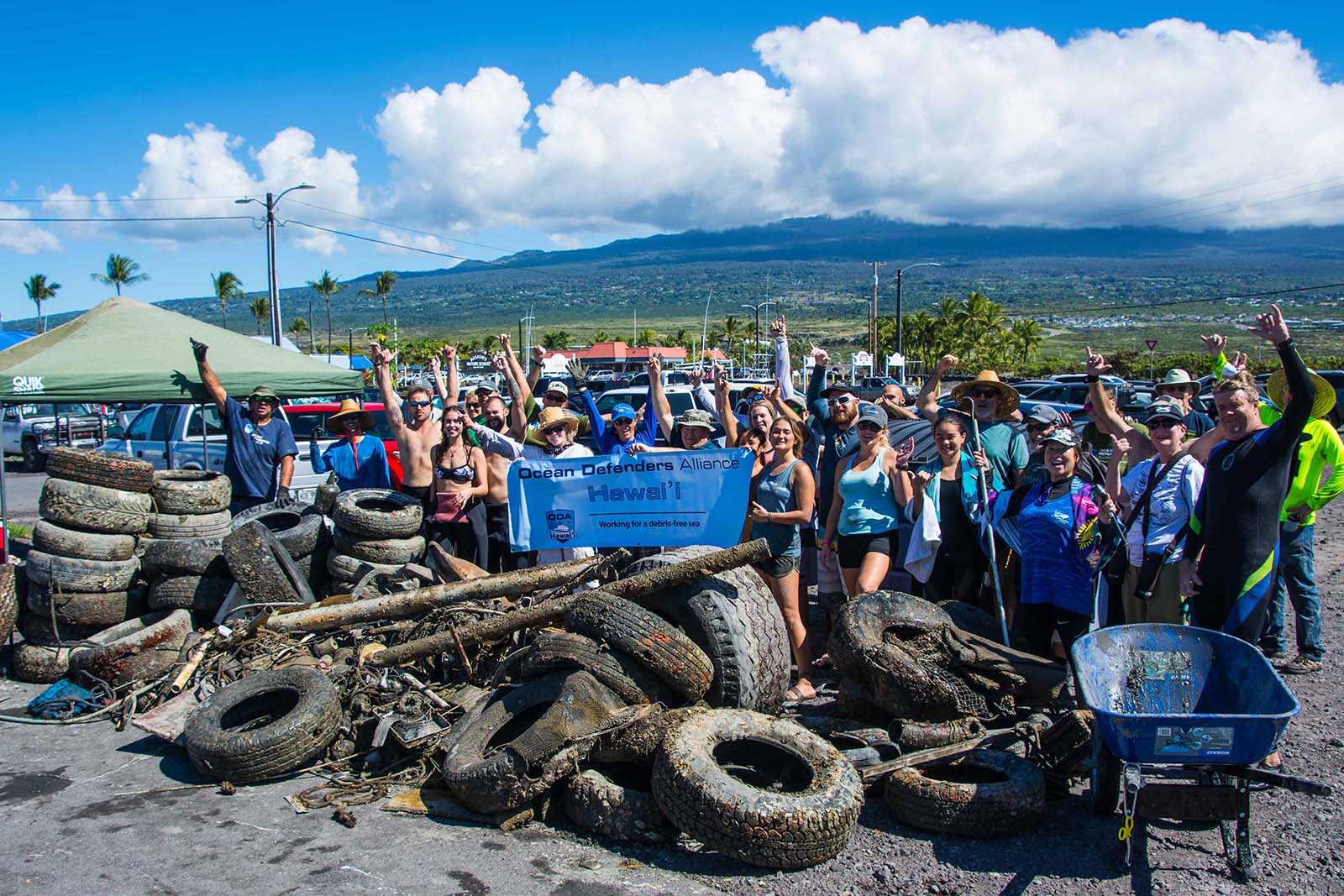 Ocean Defenders Alliance crew with debris removed from ocean