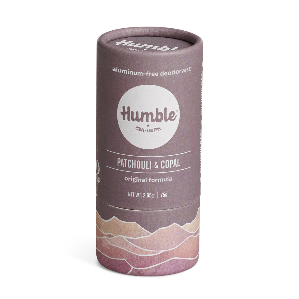 Front view of Patchouli & Copal plastic-free deodorant showing Humble logo and mountain illustration on white background