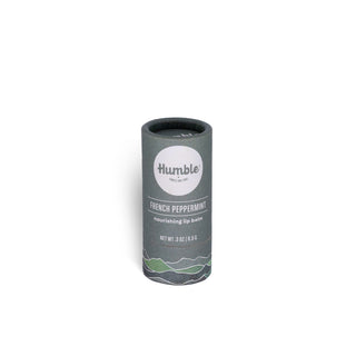 Front view of French Peppermint plastic-free lip balm showcasing cylindrical paper tube packaging labeled 0.3 ounces or 8.5 grams