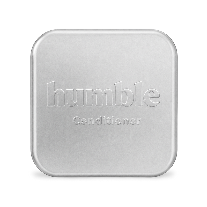 Humble Travel Tin, closed, anodized aluminum lid with the humble wordmark and Conditioner stamped into the metal