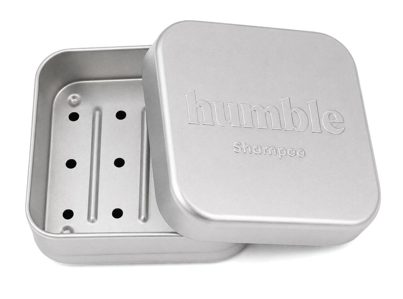 Humble Travel Tin for shampoo bars, open, showing the removable draining tray with six holes and two raised ribs