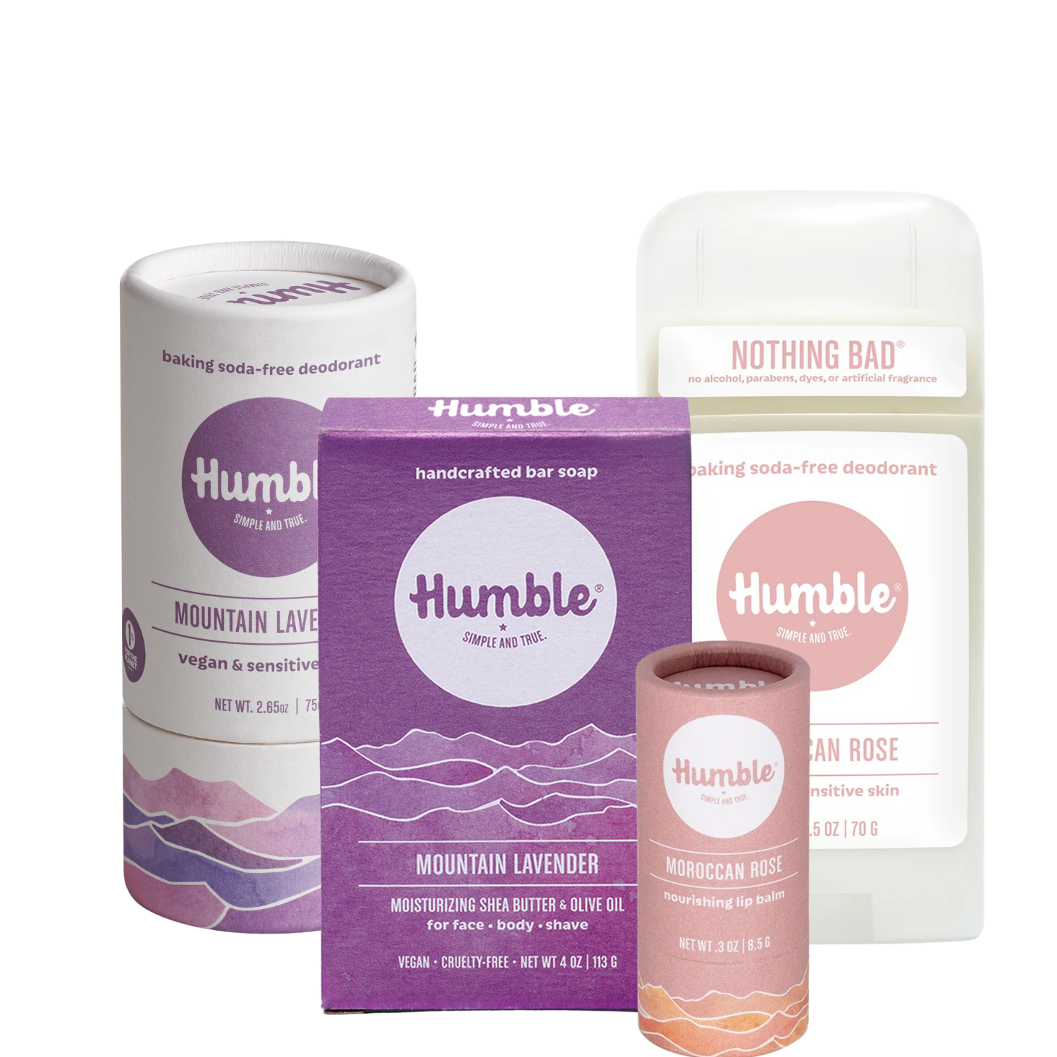 Three-quarter view of Restore Kit - Sensitive showcasing Mountain Lavender soap box, two Humble deodorant sticks, and a lip balm on a white background