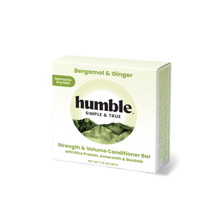 Front view of Strength & Volume Conditioner Bar, Bergamot & Ginger, showing Humble logo and green packaging on white background